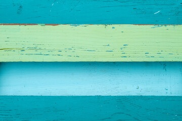 Blue and green painted wooden wall