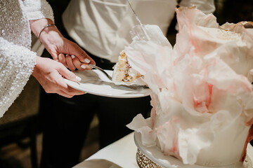 bride and groom cutting cake on their wedding day romantic white 
