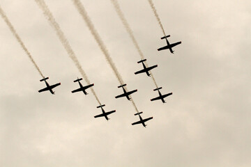 Aerobatic airplane in the sky - airplane in formation