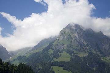 The Austrian alps rise over the European countryside
