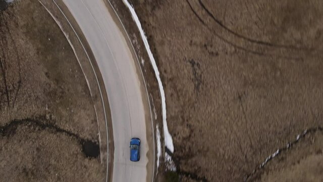 chasing a blue car with drone