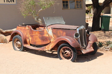 rusty car in namibia