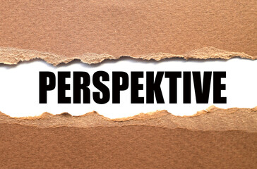 Perspective. text on white paper over torn paper background.