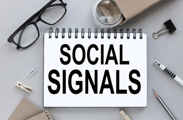 Social Signals. text on white paper on gray background