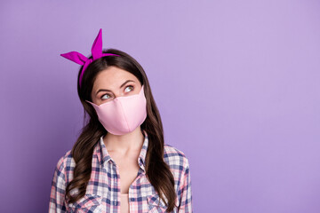 Photo portrait of dreamy curious girl in protective mask during pandemic outbreak looking copyspace...