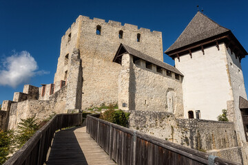 Fototapeta na wymiar Celje Old castle (Celjski Stari grad), amazing view of the stunning medieval fortification in Lasko valley in Julian Alps mountains, Celje, Slovenia, Styria. Outdoor travel background