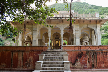 Staircase leading to a temple with many arches, in Gatore Ki Chhatriyan. Jaipur, India.
