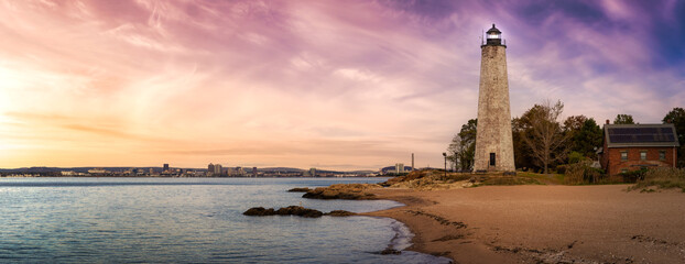 Panoramic view on a lighthouse on the Atlantic Ocean Coast. Colorful Sunrise Sky Art Render. Taken in Lighthouse Point Park, New Haven, Connecticut, United States. - Powered by Adobe