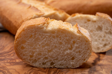 Ingredient for French breakfast, fresh baked crispy baguette white bread