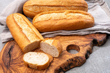 Ingredient for French breakfast, fresh baked crispy baguette white bread