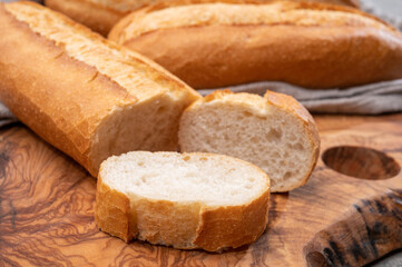 Ingredient for French breakfast, fresh baked crispy baguette white bread