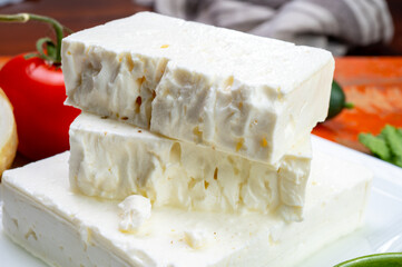 Cheese collection, white Greek salty feta cheese ready to eat