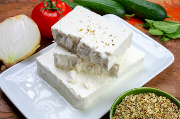 Cheese collection, white Greek salty feta cheese ready to eat