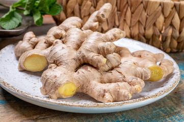 Fresh organic ginger roots, healthy food ingredient