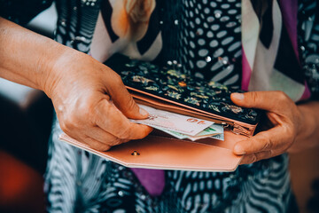 turkish lira in woman's hand