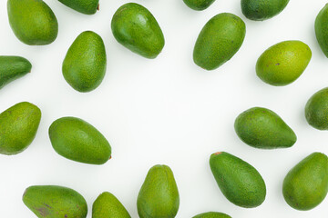 Avocado frame on white background. Flat lay, top view. Food concept.
