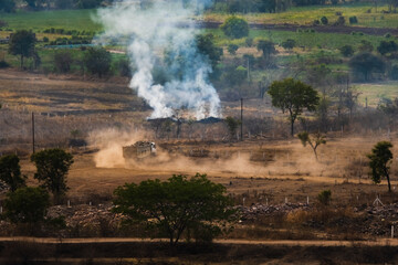 Fire in the field, stubble burning. 