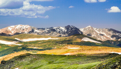 Trail Ridge Road in summertime with snow capped mountains, RMNP