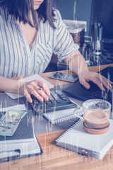 Investments. The girl buys stocks and analyzes the stock exchange, invests the budget in funds and stocks at home remotely. Work from home to quarantine, freelance. Work remotely.