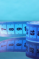 close-up colorful measuring tape on a background