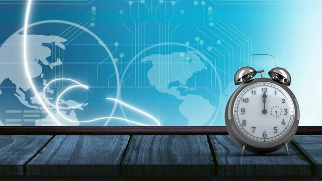 Animation of vintage alarm clock moving fast and ringing over globe spinning on blue background