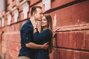 Happy young couple. The concept of a happy family with strong feelings. Young people in love
