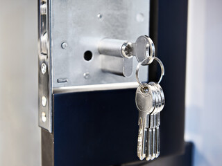 Fototapeta na wymiar Door lock with keys closeup