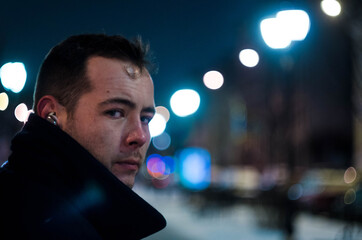 portrait of a man on the street, at night