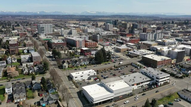 Cinematic aerial drone clip of downtown Everett, Bayside, Port Gardner, neighborhoods near the Boeing Everett Factory, bedroom communities North of Seattle on the shores of Puget Sound in Washington