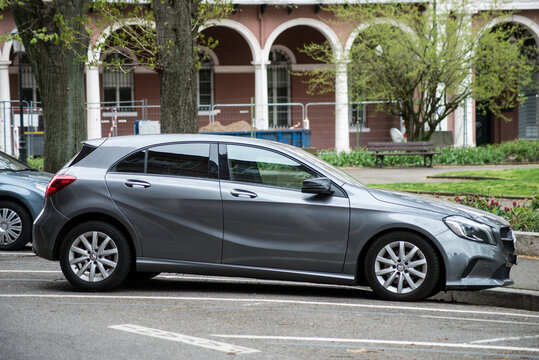 Mulhouse - France - 8 April 2021 - Profile view of new grey Mercedes A class parked in the street