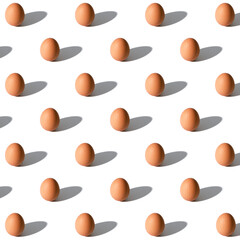 pattern of brown chicken eggs on white background