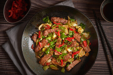 Asian Food: Homemade Beef and Pak Choy Stir Fry with Teriyaki Sauce, dark and moody style food...