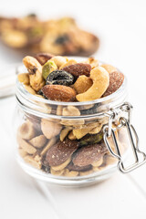 Mix of salted nuts in jar.