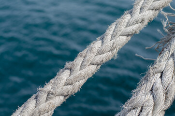 Marine rope. Moored ship. Synthetic fiber. Rope knot. Sisal rope.