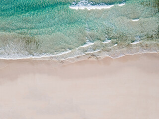 White sand beach shore top view background