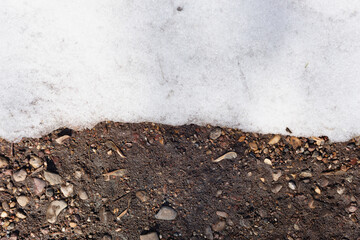 Thawed earth from under the snow in spring.