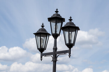 Fototapeta na wymiar Vintage street lamp. Street lighting. Architecture. Searchlight.