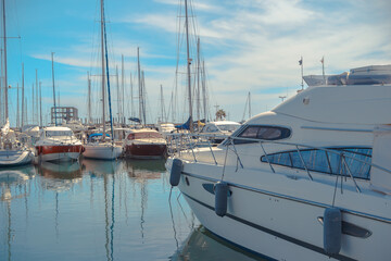 Fototapeta premium Stock Photo beauty Harbor Yacht Club with glazed clear sea and blue clouds