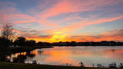 Beautiful pink, orange and blue sunset reflecting on a lake