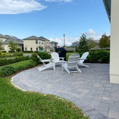 A modern nicely decorated cozy outdoor lanai