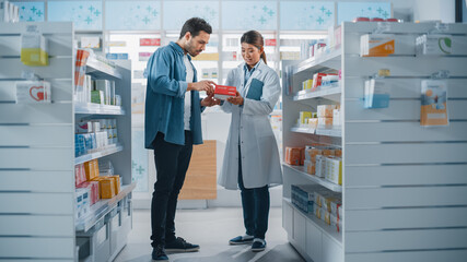 Pharmacy Drugstore: Female Asian Pharmacist Helping Latin Male Customer with Recommendation, and...