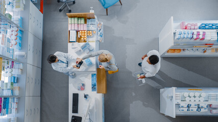 Pharmacy Drugstore Checkout Cashier Counter: Pharmacist Service Diverse Group of Customers Paying...