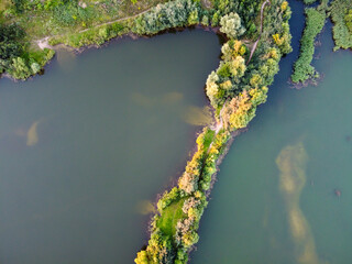 Lake water with island, summer landscape, aerial view