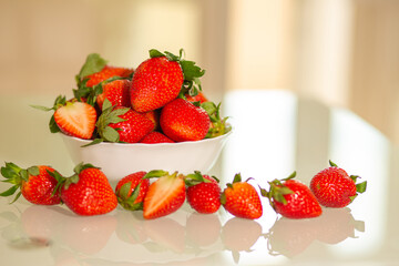 Fresh strawberries in a ceramic plate