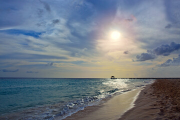 Sunset on the beach of caribbean sea.Travel background.