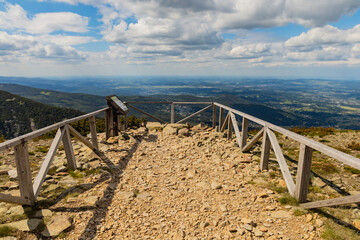 Fototapeta na wymiar View platform with panorama of Giant Mountains next to trail to Sniezka