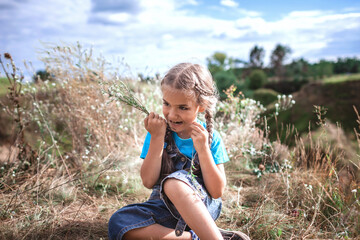 Fototapeta premium Happy girl relaxing away on nature, digital detox, escape and getaway, calm summertime, lifestyle outdoors, local travel and vacation
