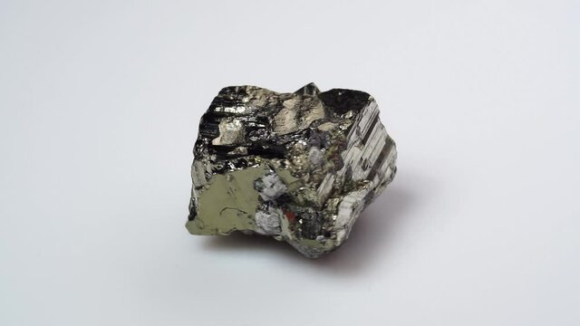 natural pyrite rough gemstone on the background