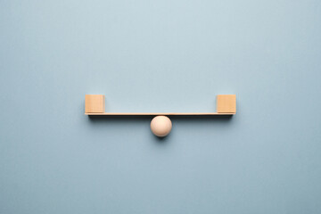 Abstract concept of balance with wooden walls.