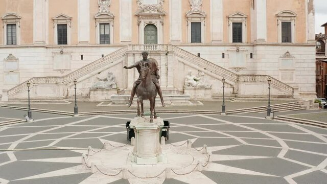 Drone view of Campidoglio or Capitolium or Capitoline Hill, seat of the City Council of Rome and the Mayor, with the statue of Marcus Aurelius. Tourist landmarks and buildings in Rome, Italy